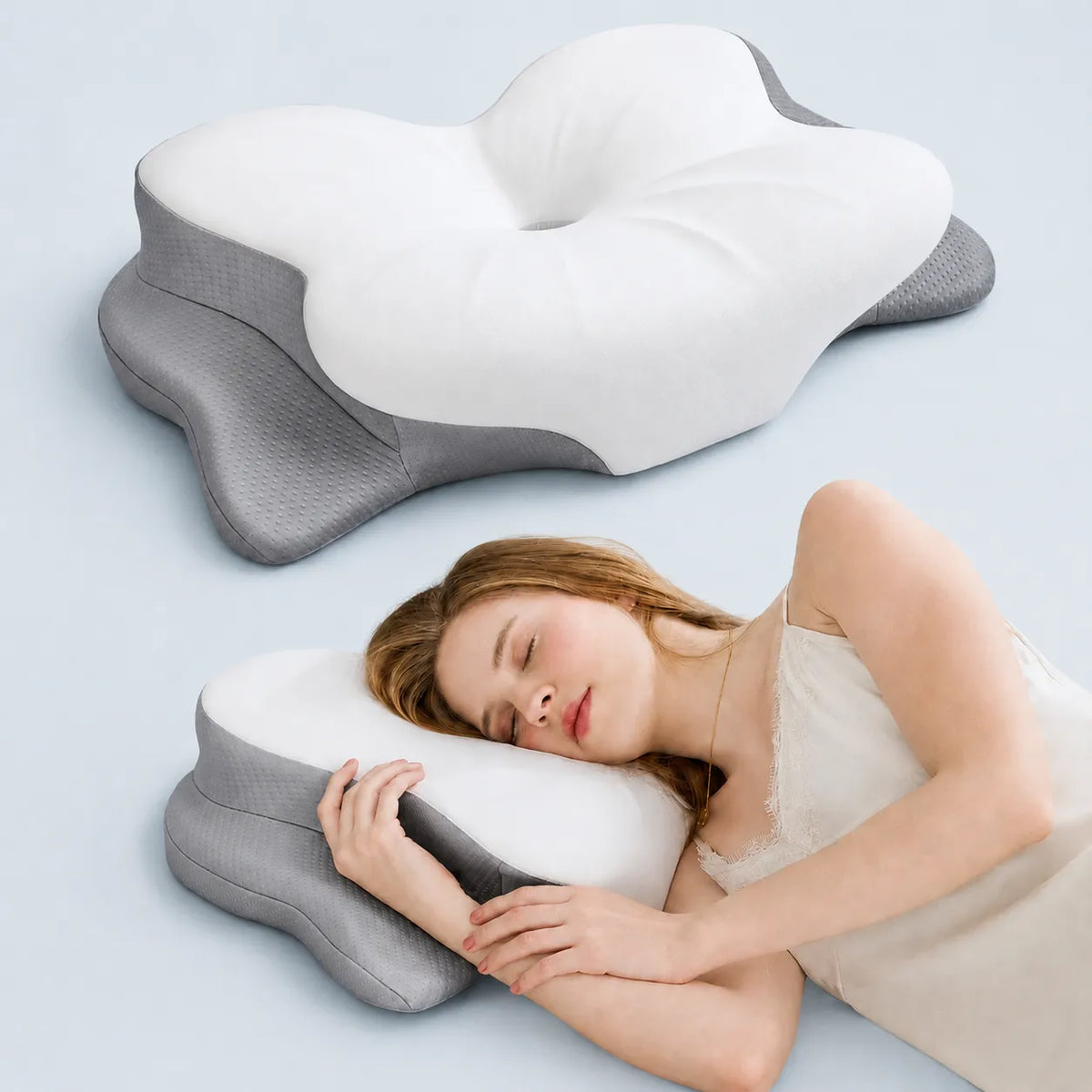 Side sleeper resting on a CosBed ergonomic memory foam pillow